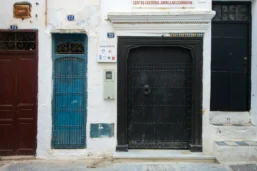 a black door and blue door